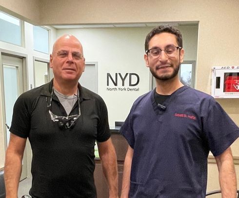 man wearing headphones in dental chair